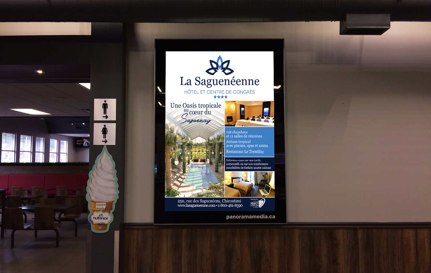 Panneau déroulant de 47''par 69'' installé dans la section dépanneur à halte routière l’Étape - Panorama Média